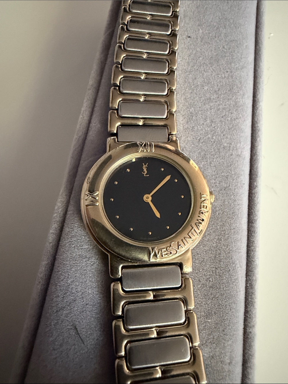 Yves Saint Laurent Gold and Black Round Dial Bracelet Watch
